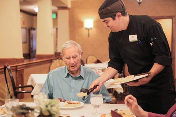 Chef serving food